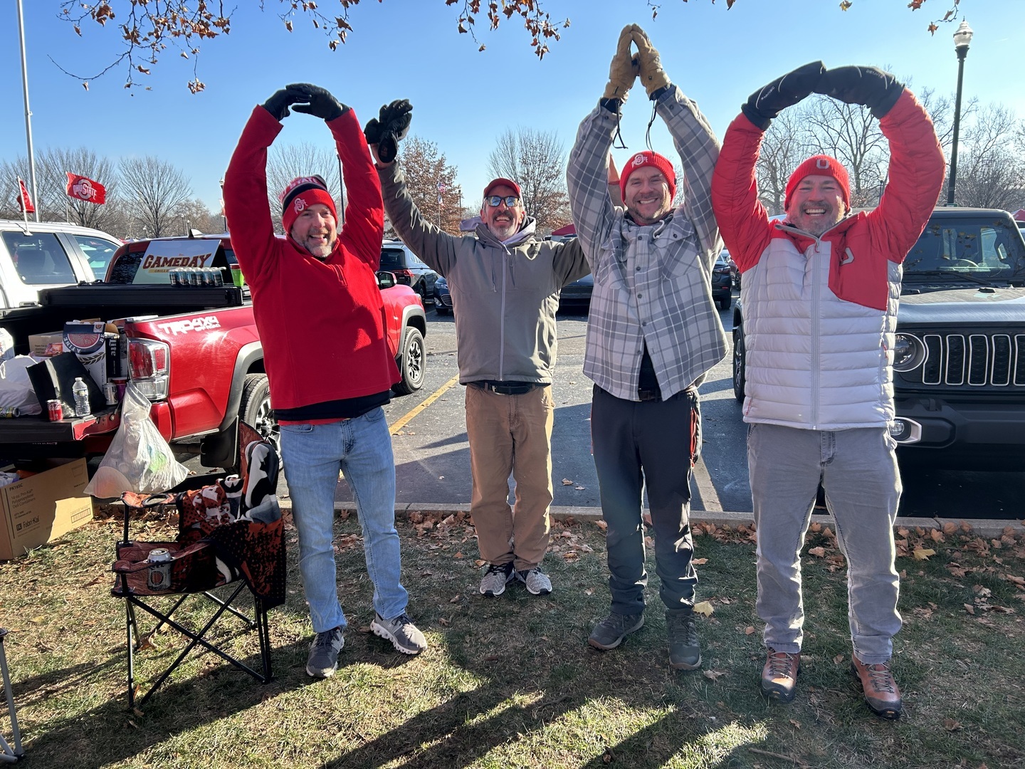 Padrick and friends cheering at an Ohio State gathering
